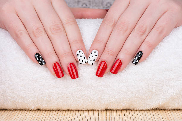 Red white polka dot nail design