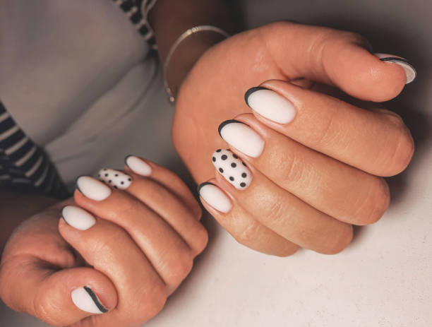 White and black French polka dot nails