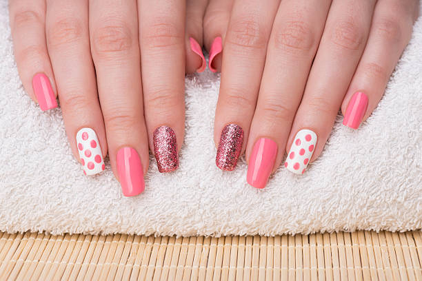 Pink polka dot nail art design