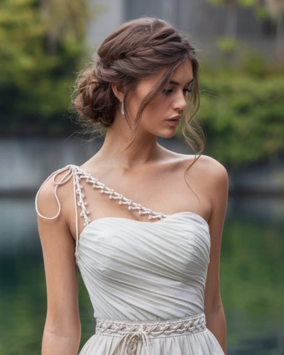 bun hairstyles with one shoulder dress