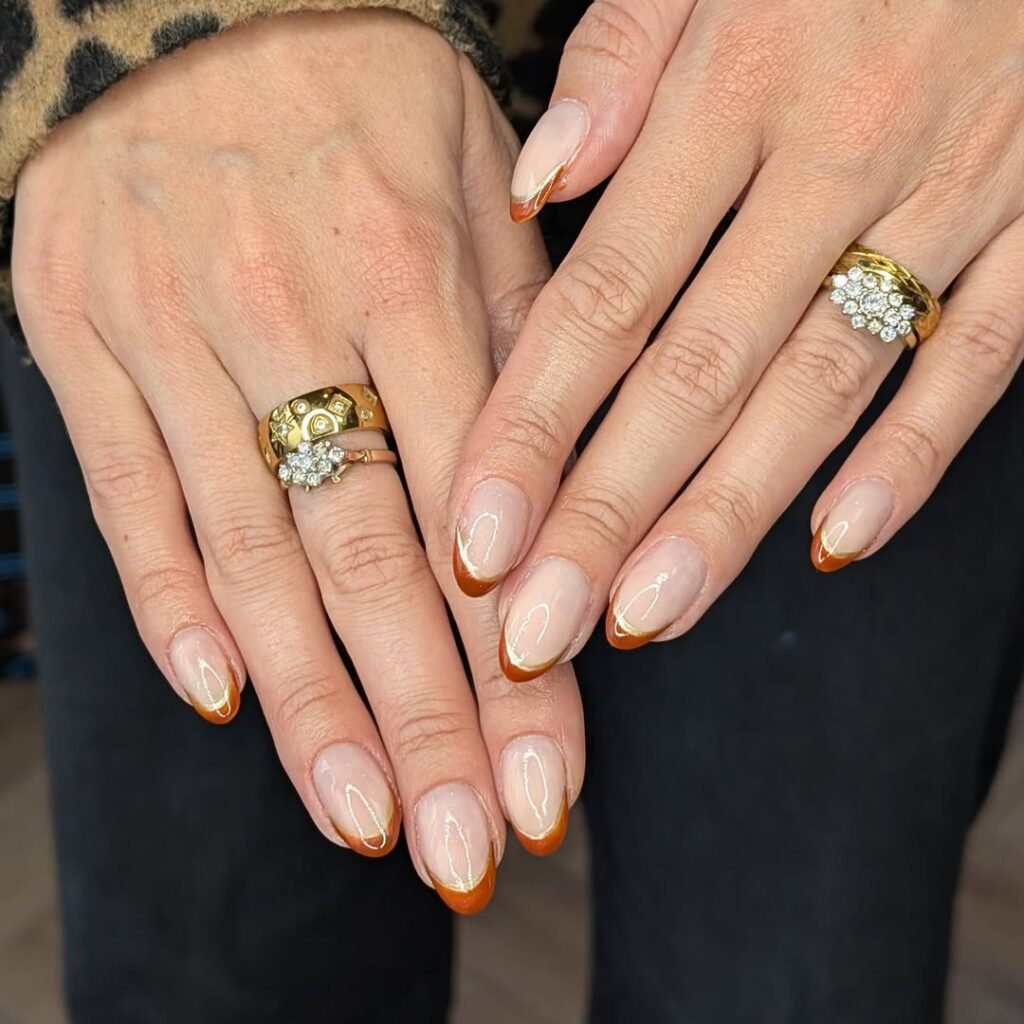 brown French nails.