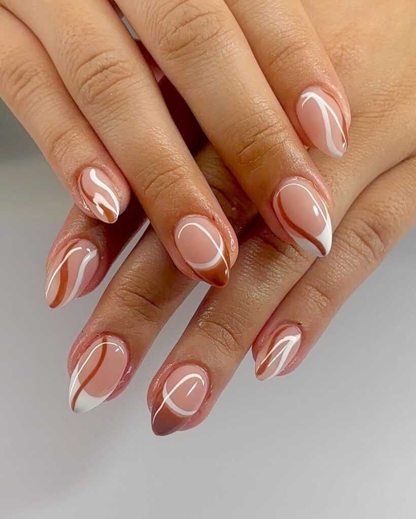 Swirl brown nails.