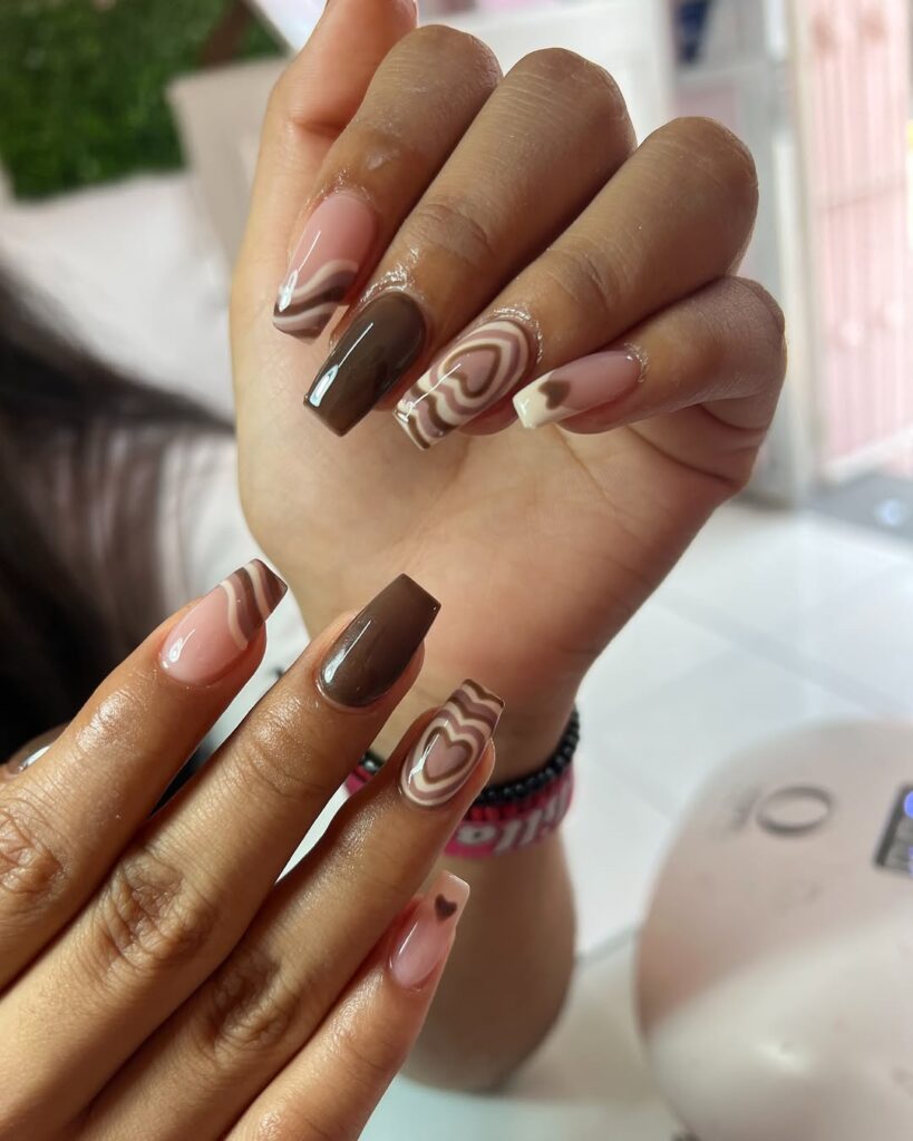 heart brown nails.