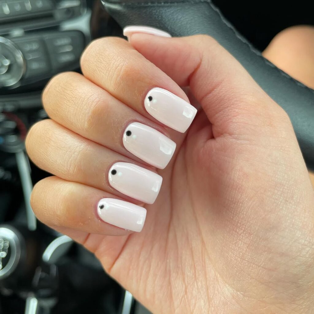 simple black dot nails.
