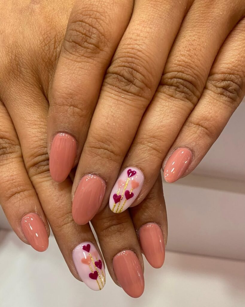 Heart balloon nails.