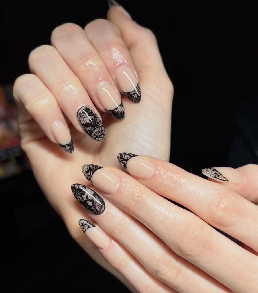 Nude black lace nails.
