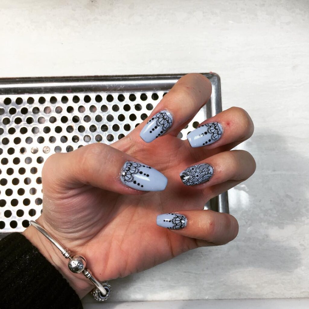 powder blue and black lace nails