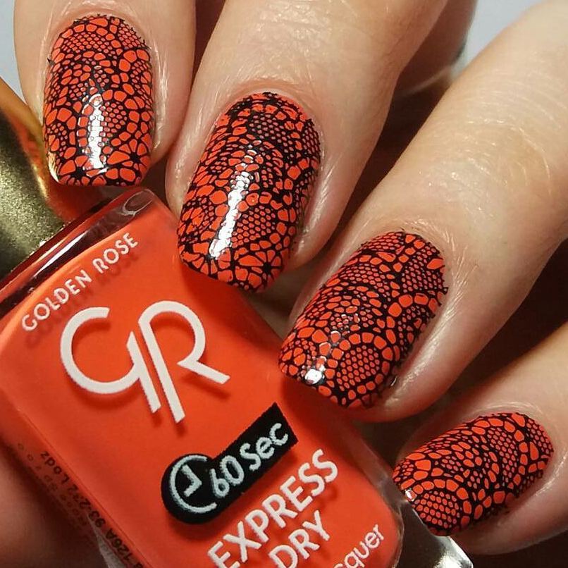 Red and black lace nails.