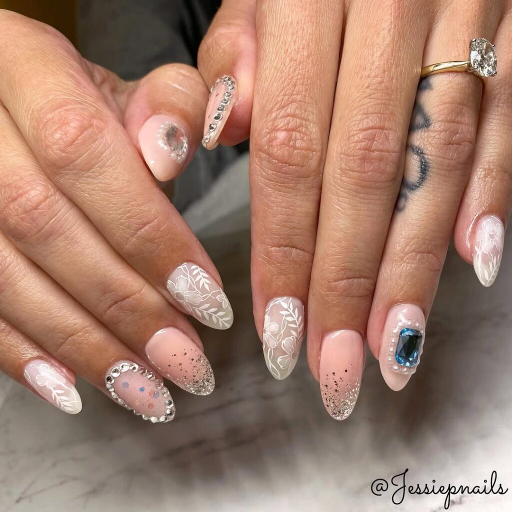 white and nude lace nails.